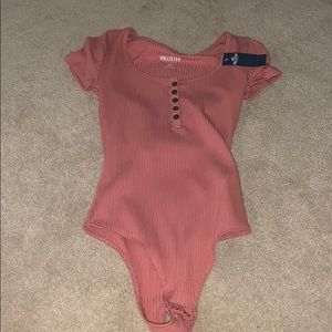 Pink bodysuit